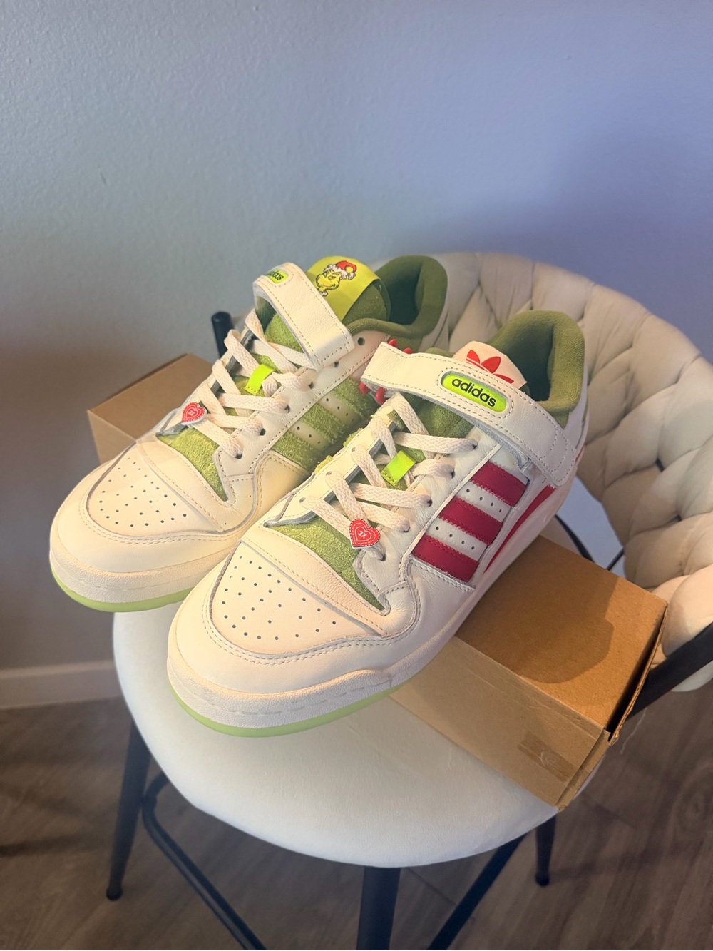 adidas men’s Grinch forum
  White Sneakers with red Stripes and Lime Accents